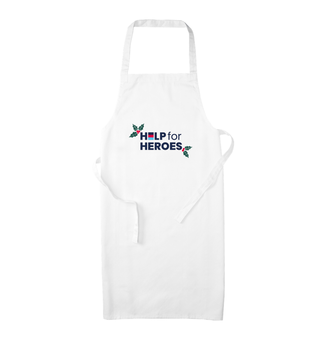 Help for Heroes white Christmas apron, with printed logo on front and holly leaves