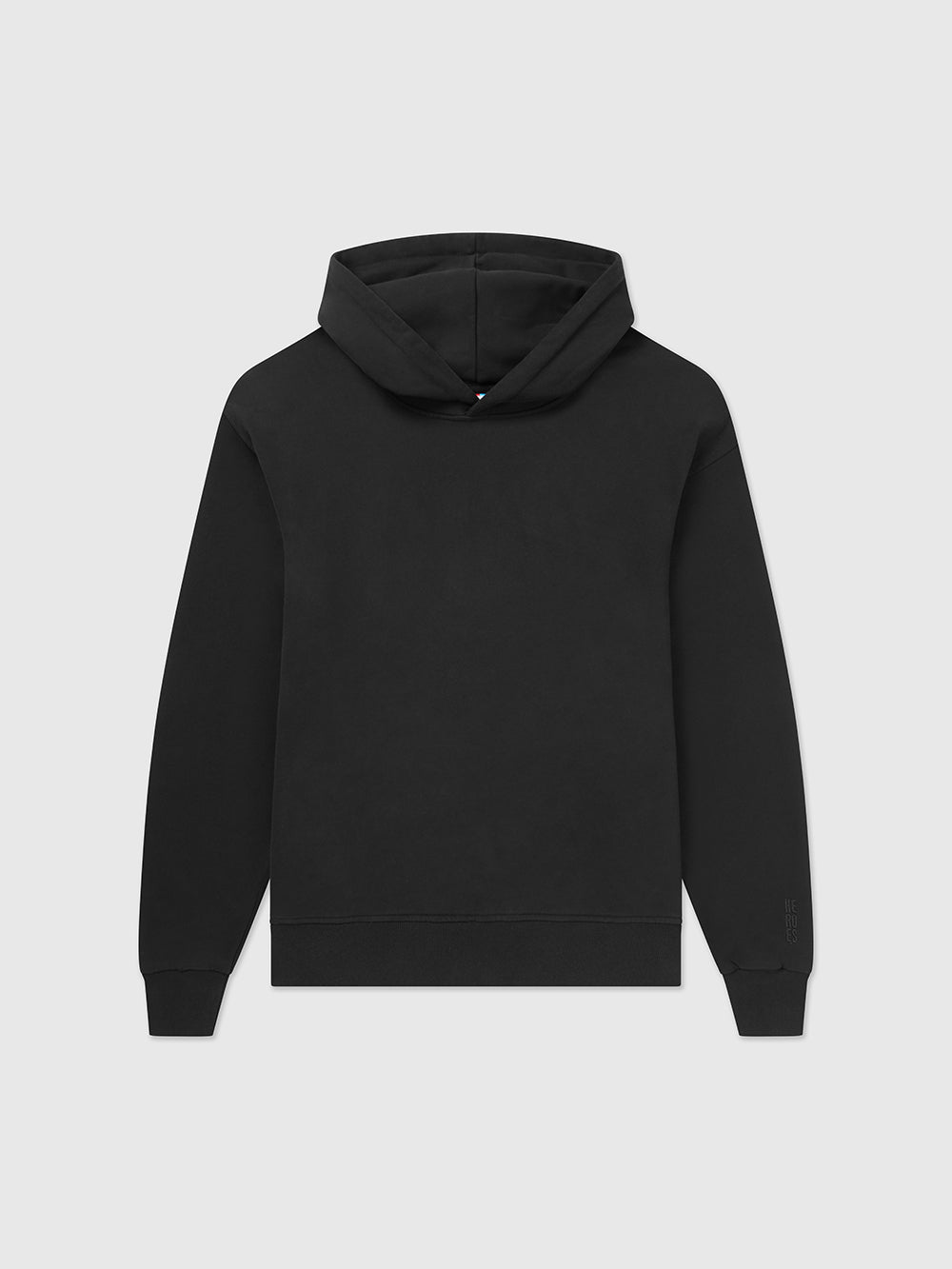 Front image of relaxed fit pullover black hoodie. Featuring a subtle embroidered Help for Heroes logo on the sleeve