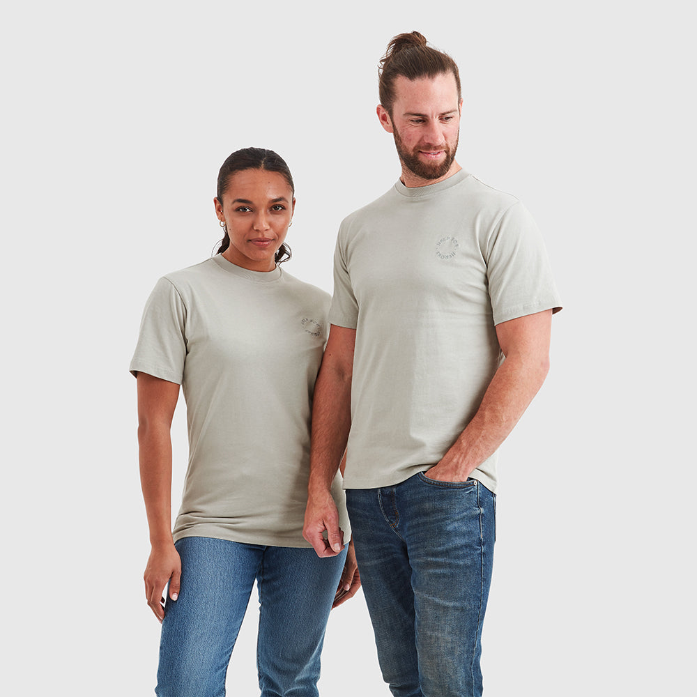 Two models wearing grey crew neck t-shirt with a subtle circular Help for Heroes logo on the chest and a rubber Heroes stack patch at the back neck.
