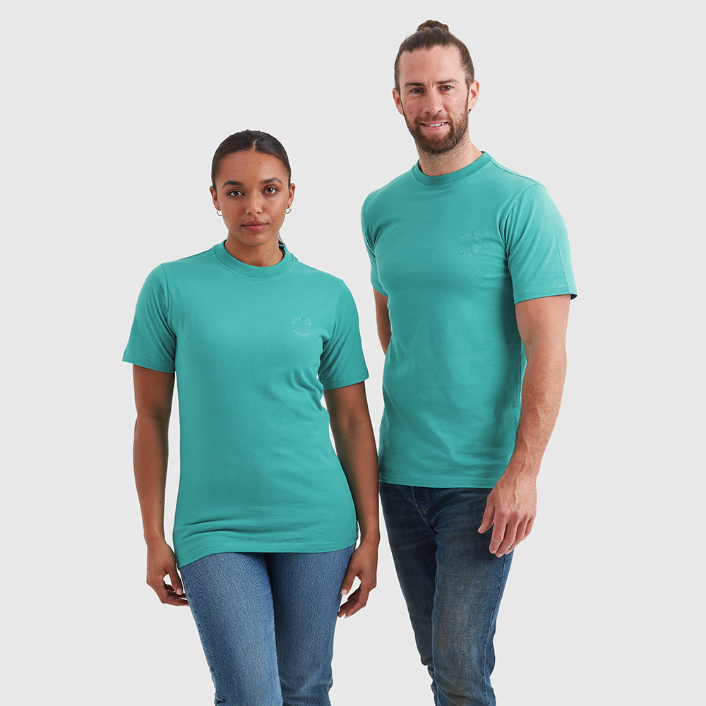 Two models wearing turquoise crew neck t-shirt with a subtle circular Help for Heroes logo on the chest and a rubber Heroes stack patch at the back neck.