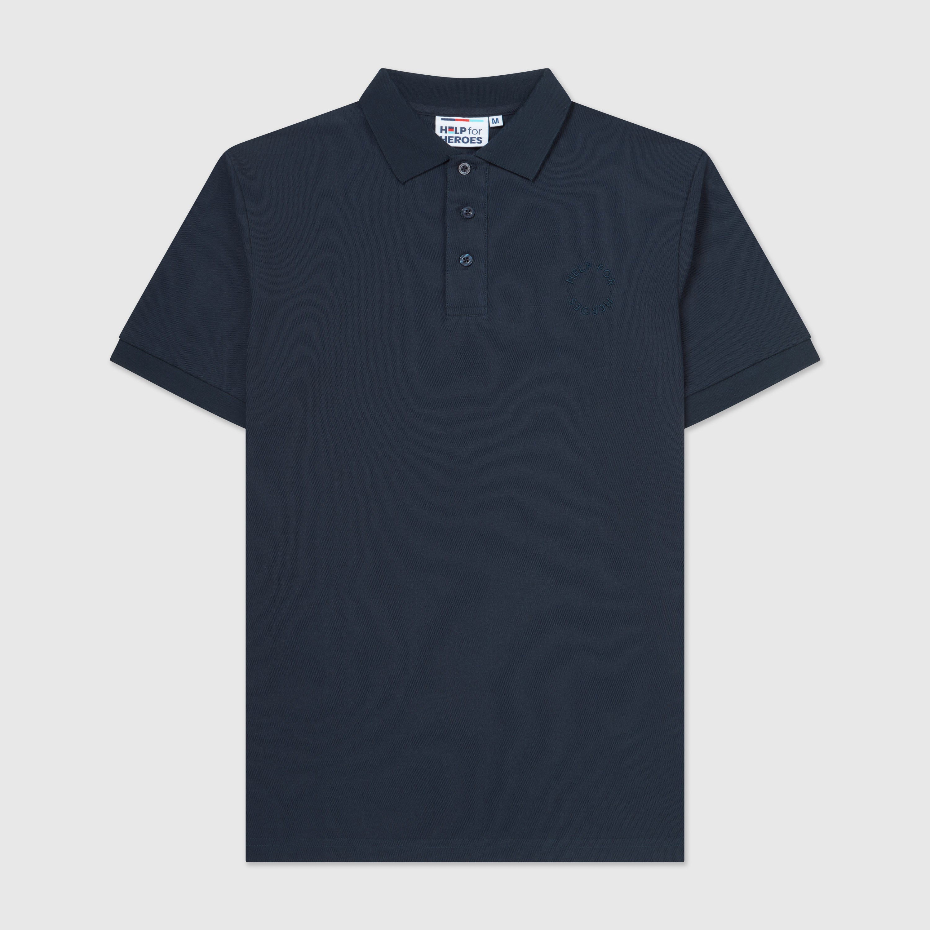 Front image of navy pique polo shirt with a subtle circular Help for Heroes logo on the chest and a rubber Heroes stack patch at the back neck.