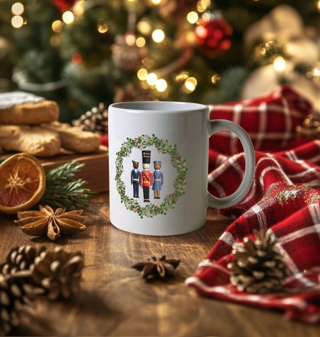 White Christmas mug with Help for Heroes Military figures inside a wreath, on a festive laid table