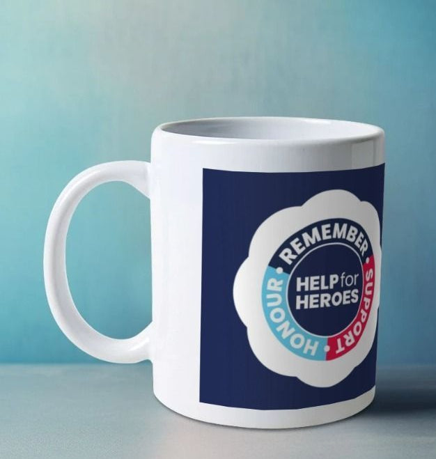 A white mug with a Help for Heroes Remembrance Day logo