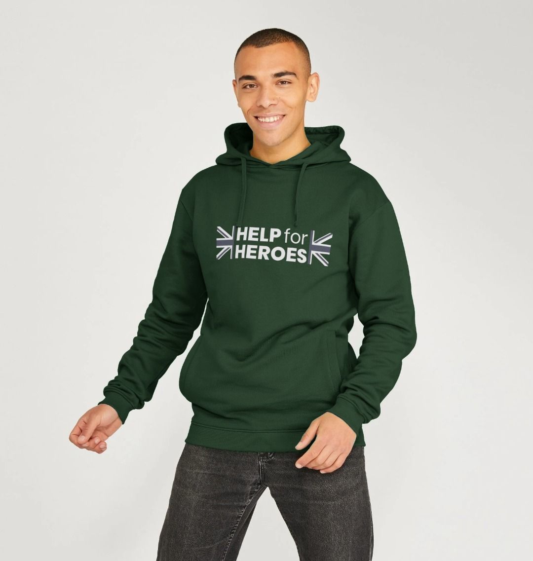 Model wearing a dark green pullover hoody with the Help for Heroes logo printed between the Union Jack flag