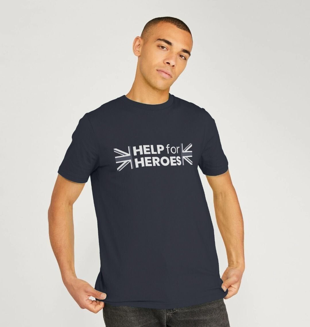 Model wearing a navy tshirt with the Help for Heroes logo printed between the Union Jack flag