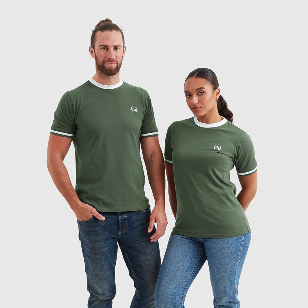 Two models wearing khaki green crew neck t-shirts with white contrast detailing and a small embroidered Help for Heroes wreath logo on the chest