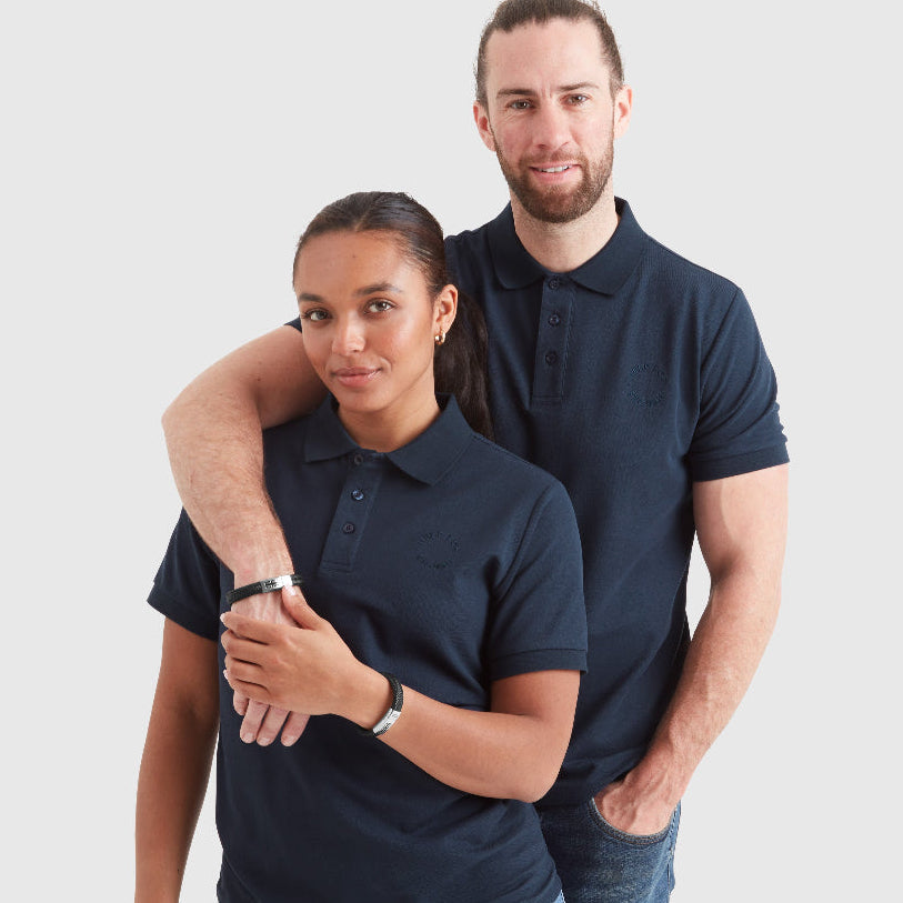 Models wearing black leather chunky bracelets with a clasp featuring the Union Jack flag and the 'Help for Heroes' logo.