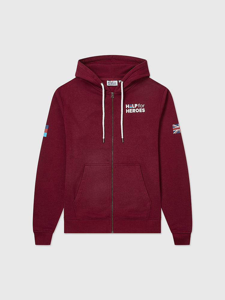 Front image of burgundy zipped hoody featuring printed Help for Heroes logo on the front and Stretcher Bearer logo on the back. Union Jack flag printed on sleeve