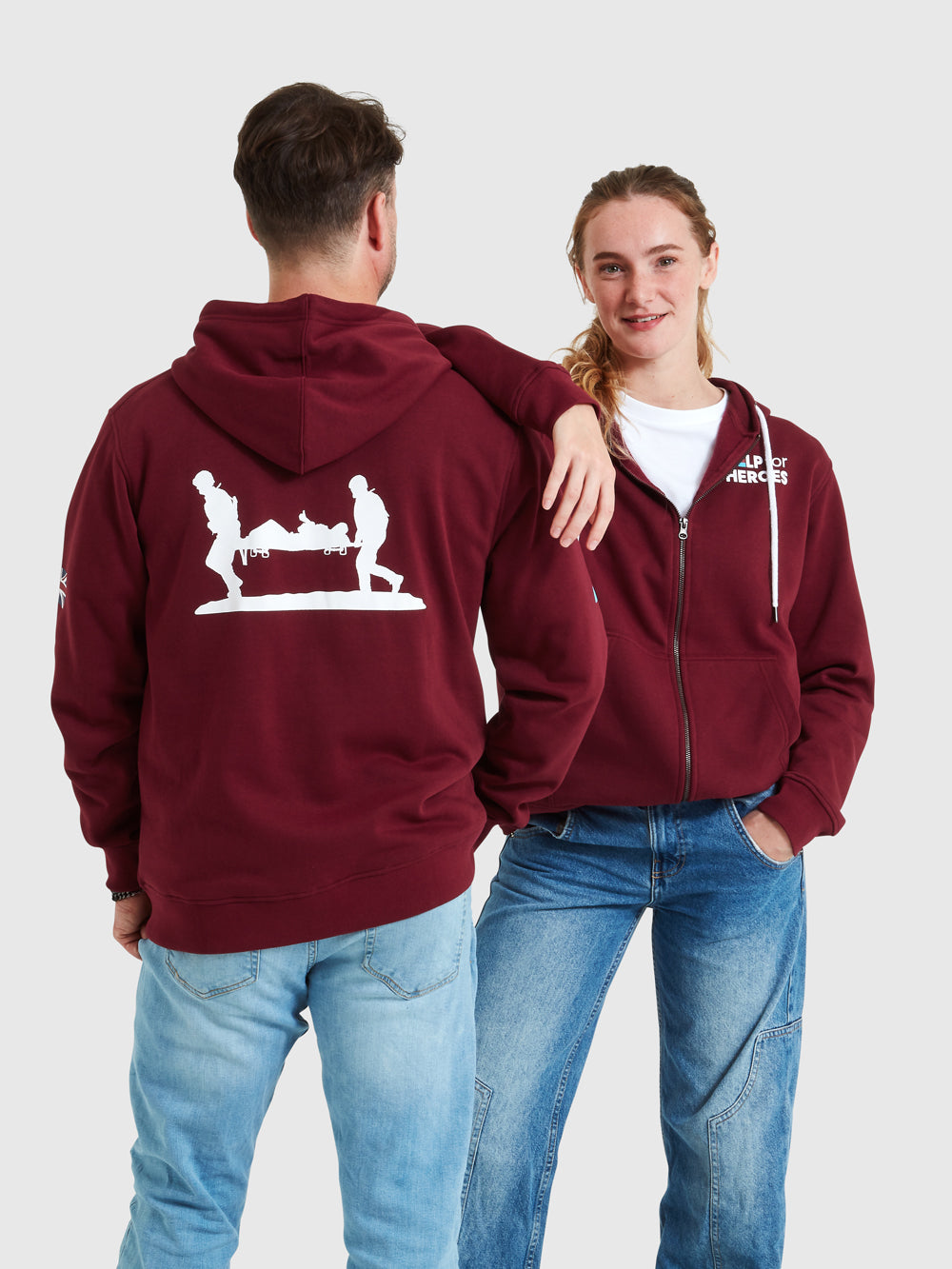 Models wearing burgundy zipped hoody featuring printed Help for Heroes logo on the front and Stretcher Bearer logo on the back