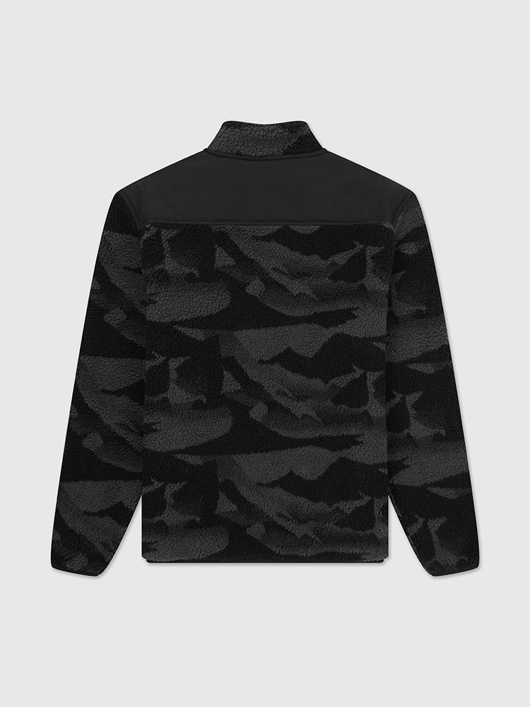 Flat lay image of black camo help for heroes fleece