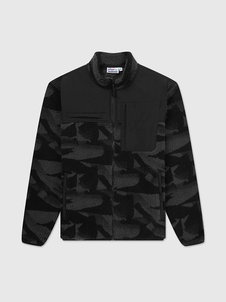 Flat lay image of black camo help for heroes fleece