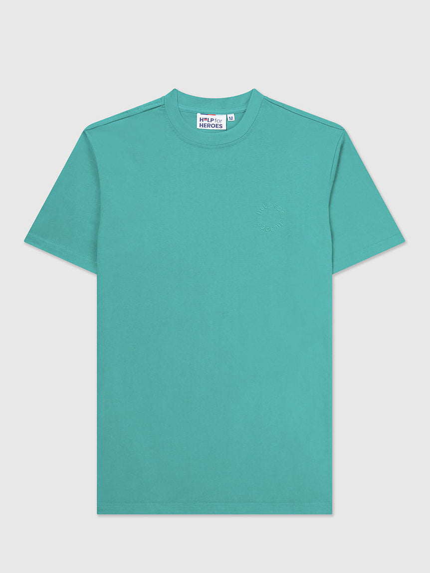 Front image of turquoise crew neck t-shirt with a subtle circular Help for Heroes logo on the chest and a rubber Heroes stack patch at the back neck.
