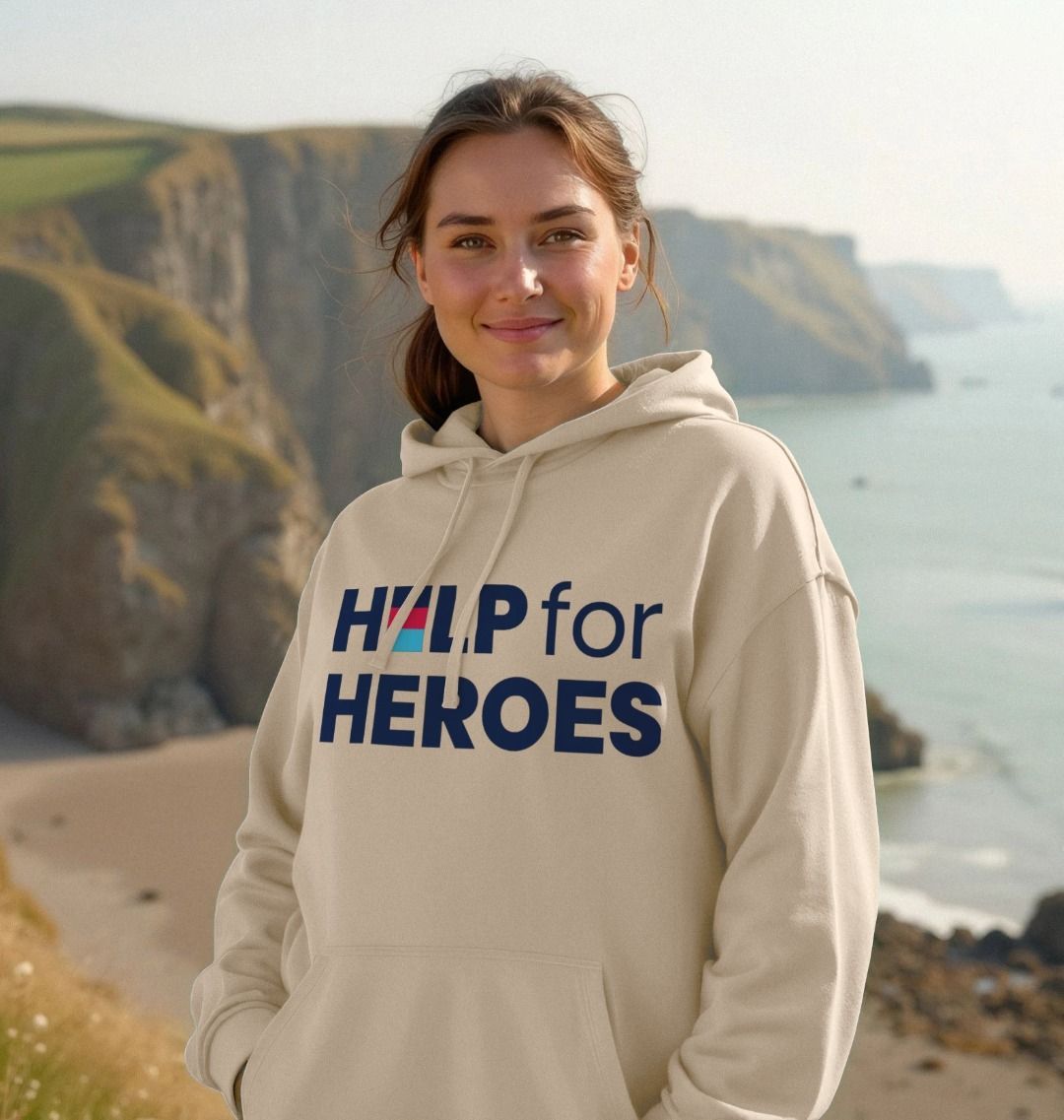 Female model wearing Help for Heroes organic cotton Logo Hoodie in Oat