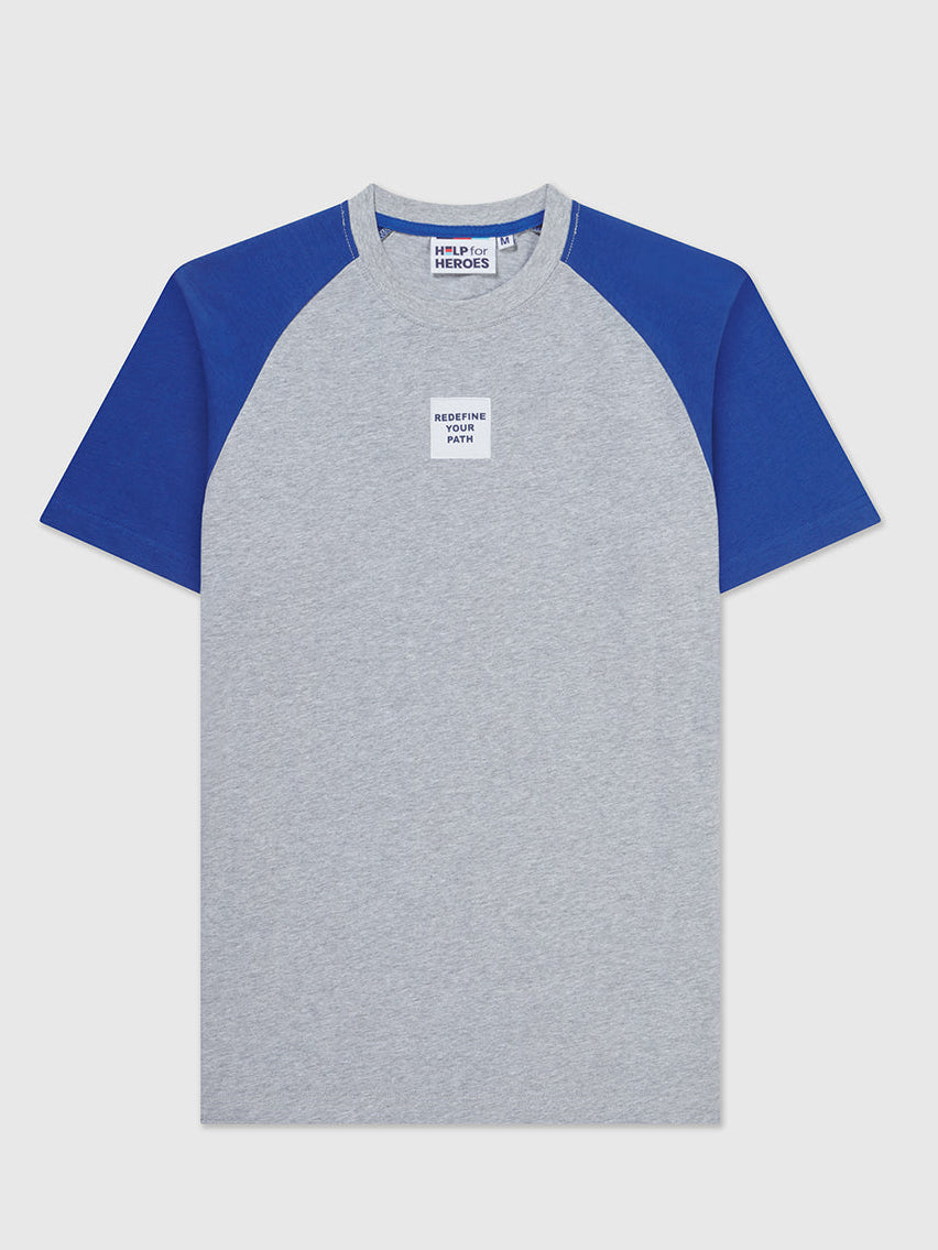 Front image of a Help for Heroes crew neck grey t-shirts with contrasting blue sleeves. Featuring a chest patch with "redefine your path" text
