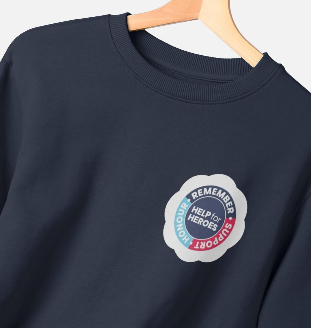 Close up of the Help for Heroes Remembrance Day logo on a navy sweatshirt
