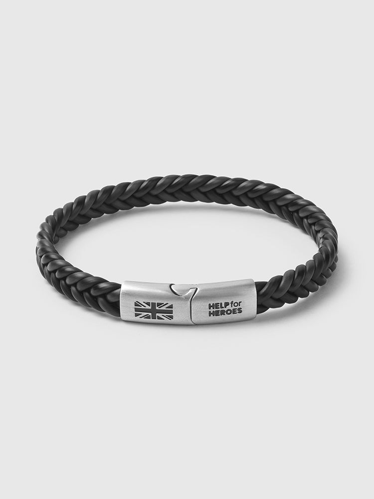 Help for heroes slim wristband in grey. Featuring metal clasp with the logo and union jack flag