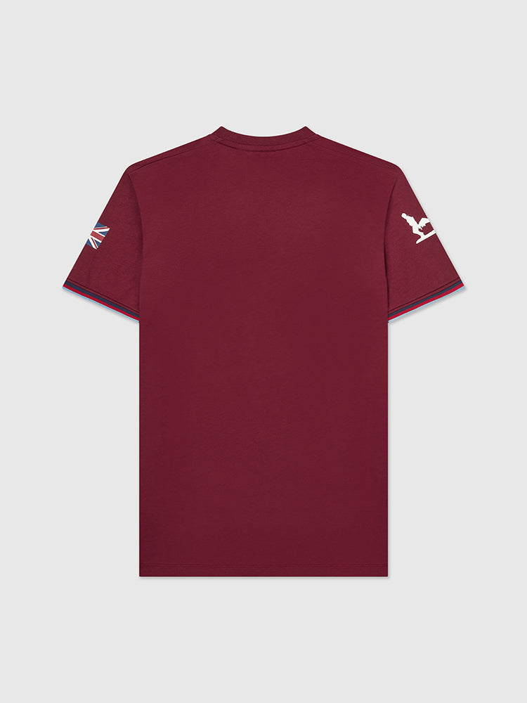 Back image of burgundy shirt with Help for Heroes logo printed on chest. Also features stretcher bearer logo and Union Jack flag on sleeves. Tri colour tipped sleeves.