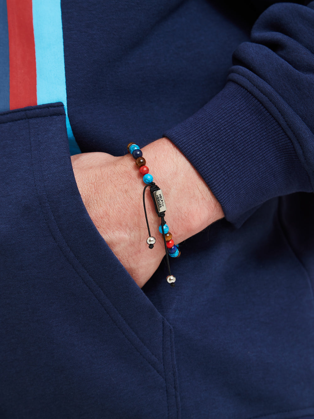 Help for heroes adjustable tri colour beaded wristband modelled on wrist